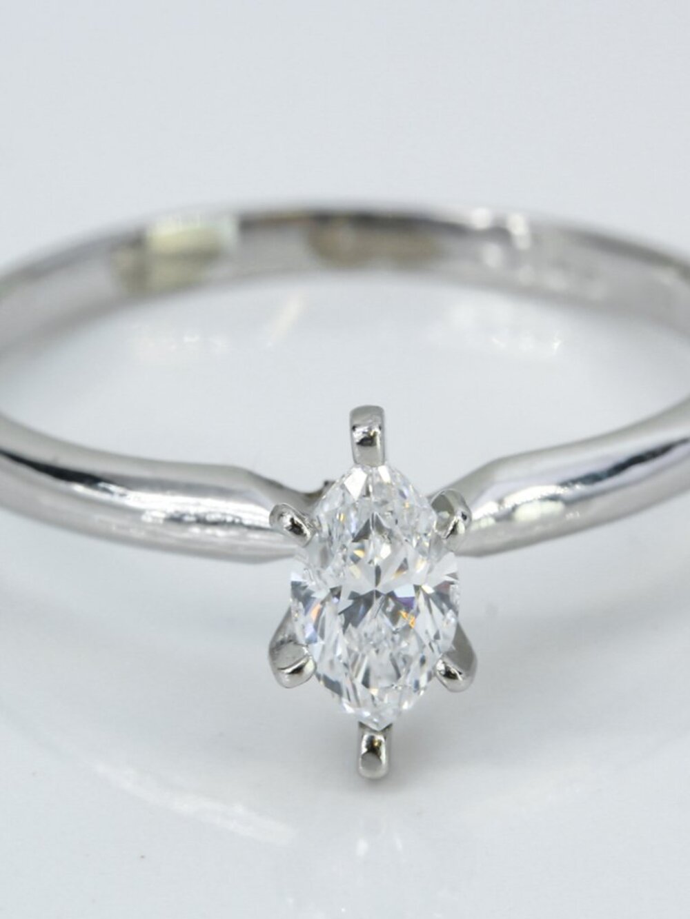Platinum Marquise‑Cut Diamond Solitaire Engagement Ring